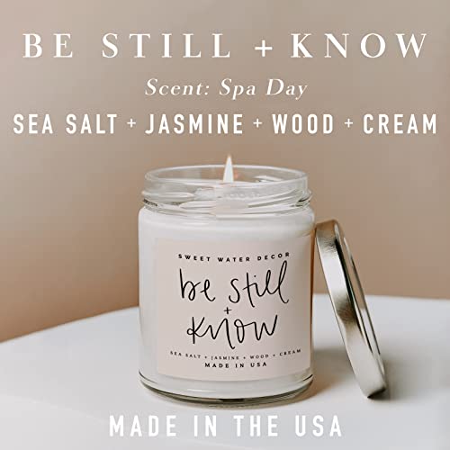 Sweet Water Decor, Be Still and Know, Sea Salt, Jasmine, Cream, and Wood Scented Soy Wax Candle for Home | 9oz Clear Jar, 40 Hour Burn Time, Made in the USA