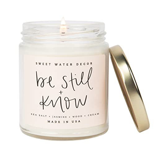 Sweet Water Decor, Be Still and Know, Sea Salt, Jasmine, Cream, and Wood Scented Soy Wax Candle for Home | 9oz Clear Jar, 40 Hour Burn Time, Made in the USA